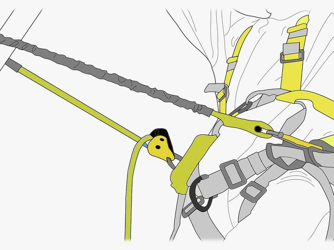 Ein Arbeiter trägt ein Positionierungssystem. Es ist auf Schulterhöhe und Hüfthöhe mit zwei separaten Verbindungsmitteln (Seilen) befestigt. So kann er freihändig arbeiten.